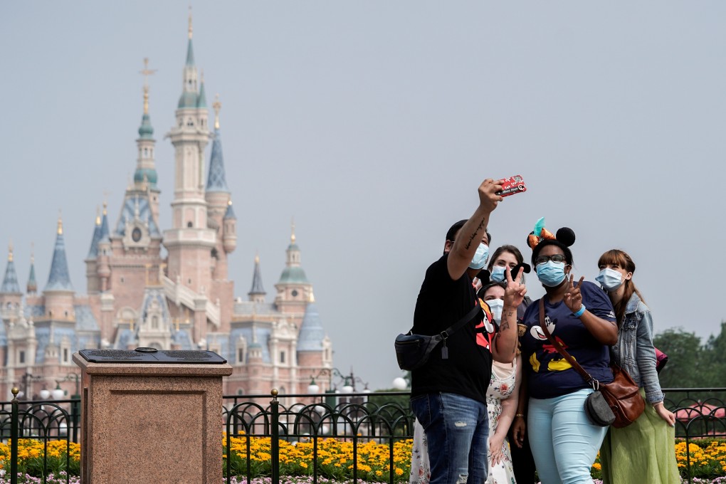 Shanghai Disneyland shut down on Sunday after it was linked to a Covid-19 case. It announced it would be closed on Monday and Tuesday but did not say when it would reopen. Photo: Reuters
