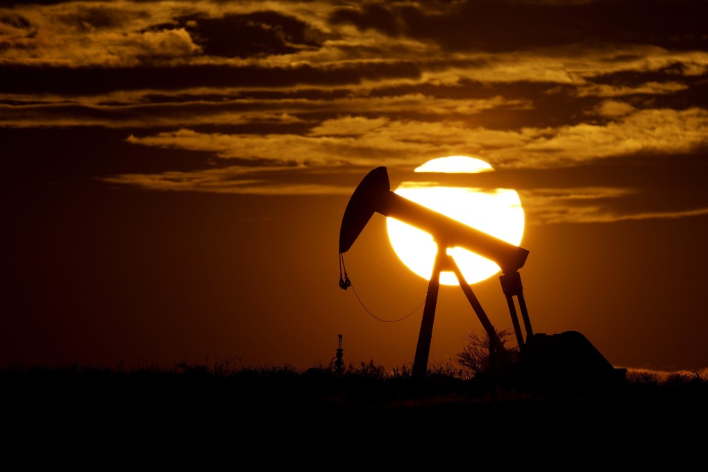 In this April 8, 2020 file photo, the sun sets behind an idle oil pump jack near Karnes City, US. Photo: AP