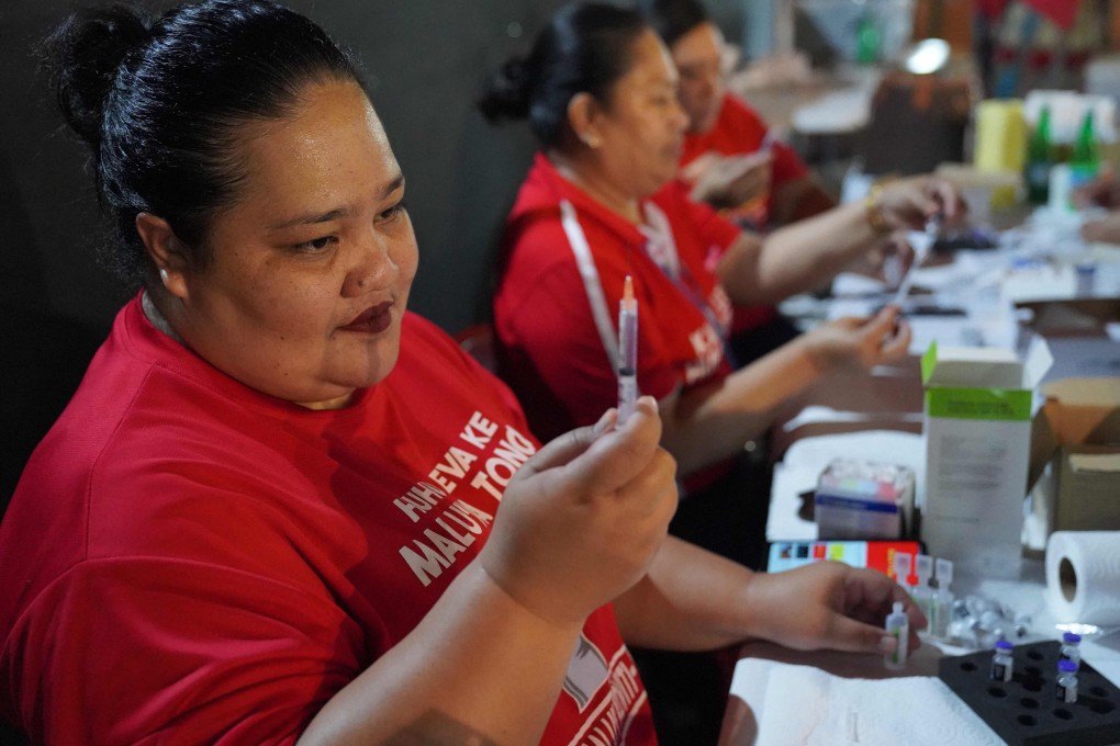 A Tongan nurse preparing a shot of Pfizer vaccine inside Queen Salote Memorial Hall in Nuku'alofa in October. Photo: Matangi Tonga via AFP