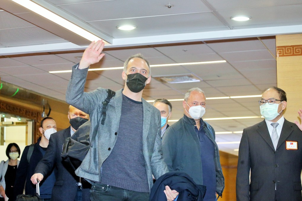 French lawmaker Raphael Glucksmann waves as the delegation arrives at the Taoyuan International Airport in Taipei on Wednesday. Photo: CNA