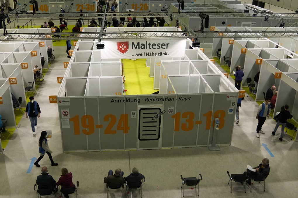 People wait at a Covid-19 vaccination centre in Berlin, Germany. Photo: AP