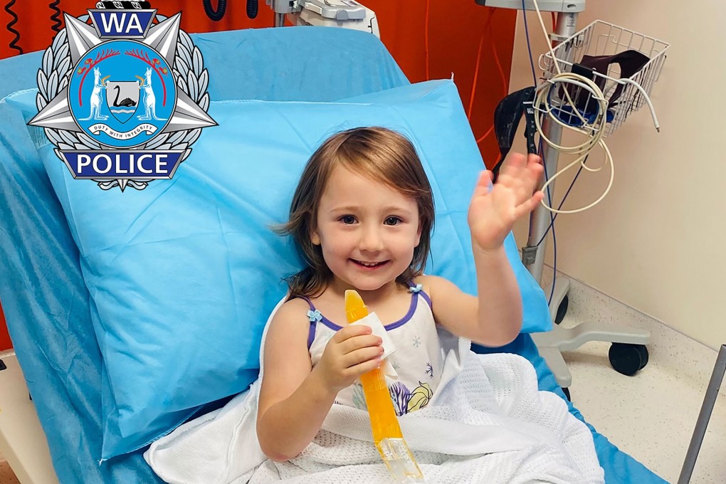 In this photo provided by the Western Australia Police, Cleo Smith waves as she sits on a bed in hospital after being found in the early hours of Wednesday morning. Photo: AP