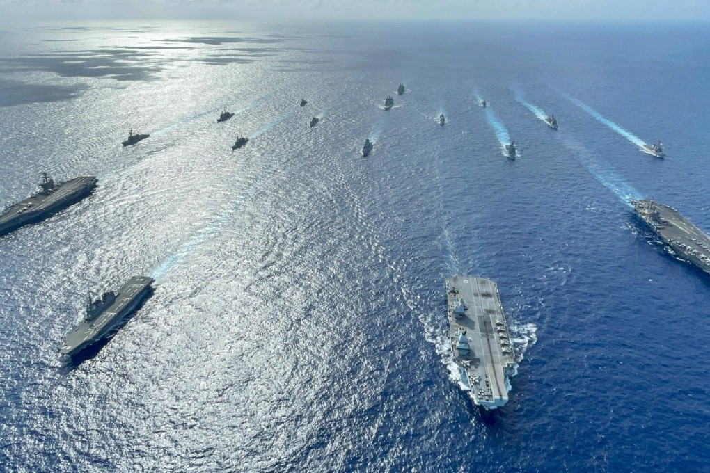 British, Japanese and US warships pictured during a carrier group excercise in the Philippine Sea. Photo: Handout