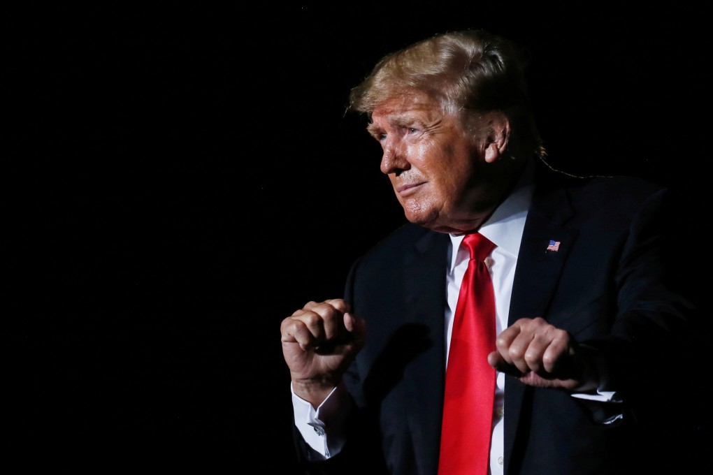 Former US president Donald Trump reacts after his speech during a rally in Iowa in October. Photo: Reuters