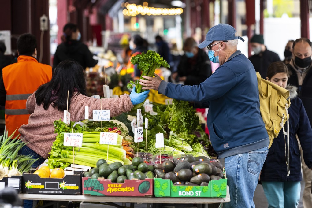 An Australian man shops at a market. Western Australia’s sparsely populated north has some of the lowest vaccination rates in the country. Photo: EPA-EFE