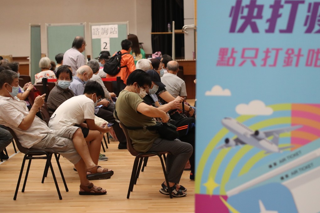 Residents, mostly the elderly, wait at Shek Lei Community Hall for their Sinovac shots under a government outreach programme. Photo: Edmond So