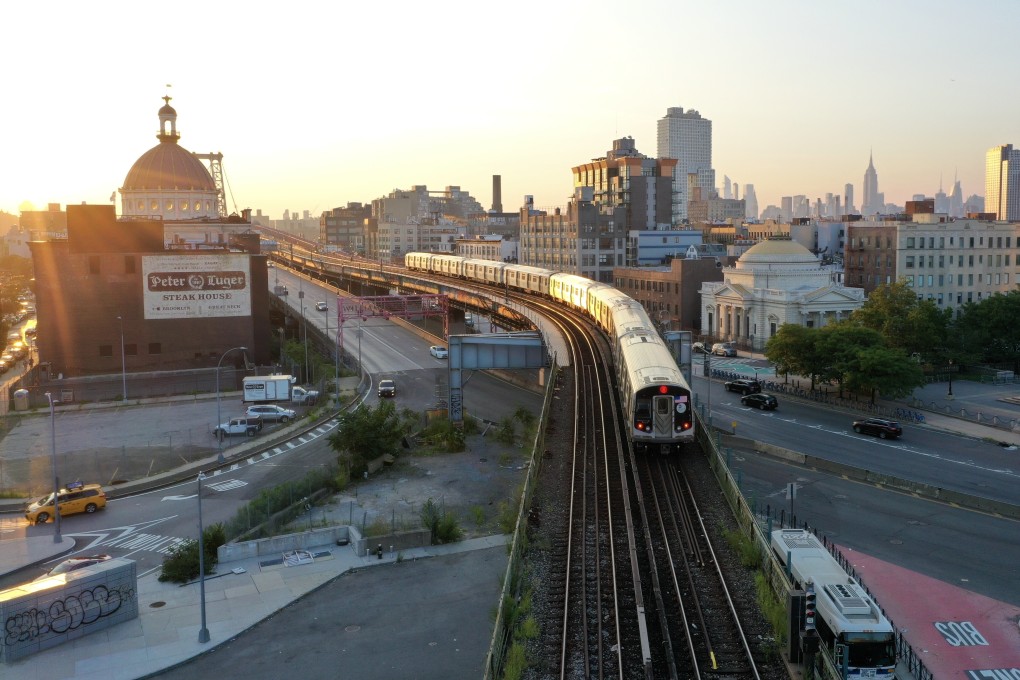 Subway trains run over the Williamsburg Bridge in New York City. Photo: Anadolu Agency via Getty Images
