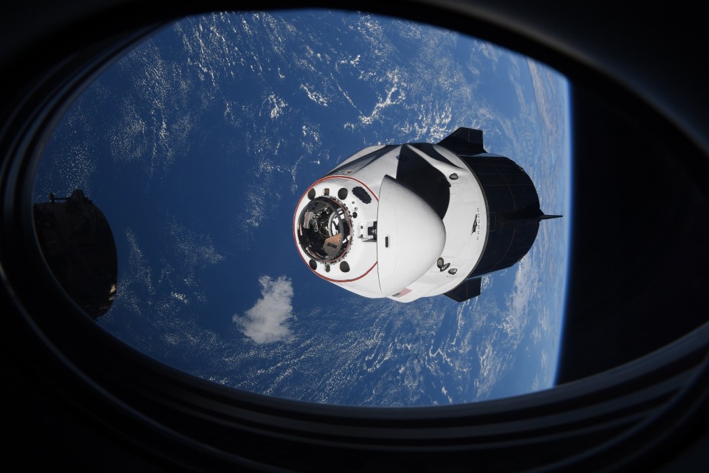 The SpaceX Crew Dragon capsule approaches the International Space Station for docking in April. Photo: Nasa via AP