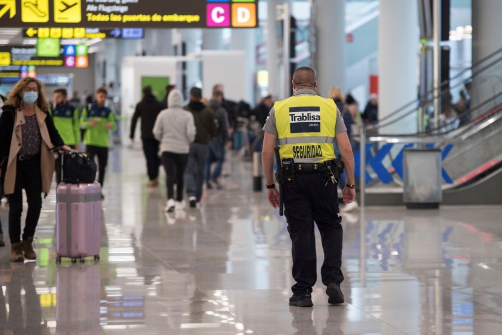 A security guard in Spain’s Palma de Mallorca airport on Saturday. Photo: EPA-EFE