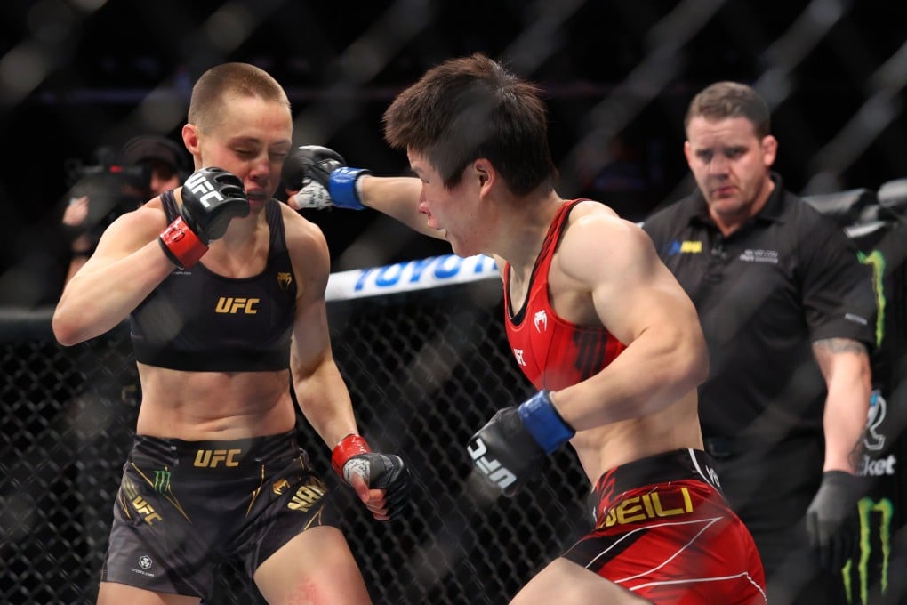 Zhang Weili throws a punch at Rose Namajunas during UFC 268 at Madison Square Garden. Photo: Ed Mulholland/USA TODAY Sports