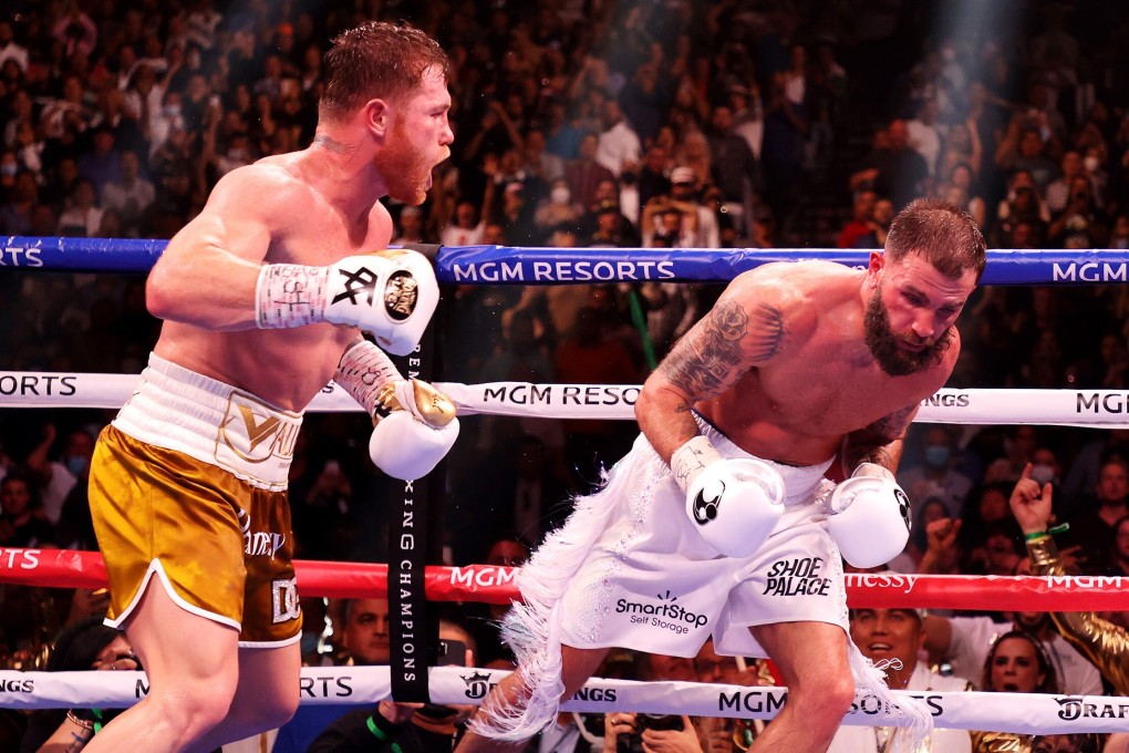 Canelo Alvarez punches Caleb Plant against the ropes during their championship bout. Photo: TNS