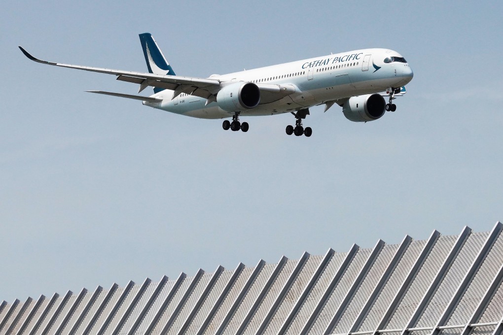 Cathay hopes to get passengers to use a paperless mobile health app that stores details of vaccinations and Covid-19 test results. Photo: Winson Wong