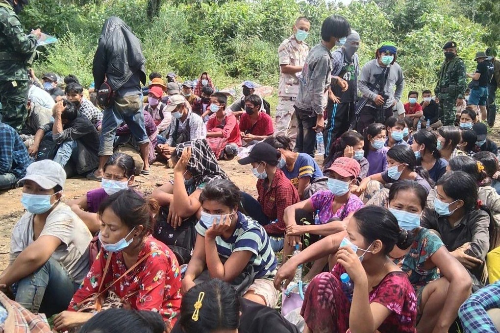 Myanmar migrants seen apprehended at the border with Thailand earlier this month. Photo: Royal Thai Army Handout via AFP