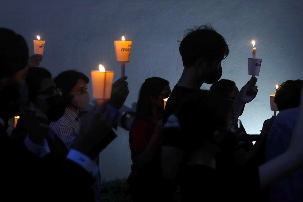 Activists at a vigil protesting against the impending execution of Nagaenthran K. Dharmalingam, who was convicted of a drug offence 10 years ago in Singapore. Photo: EPA