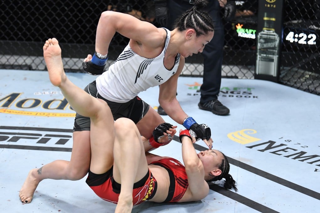 Carla Esparza punches Yan Xiaonan of China in their UFC strawweight bout in Las Vegas, Nevada. Photo: Chris Unger/Zuffa LLC