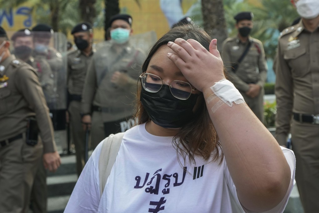 Pro-democracy activist Panusaya Sithijirawattanakul leaves the Constitutional Court in Bangkok where her protest activities came under legal review on November 10. Photo: AP