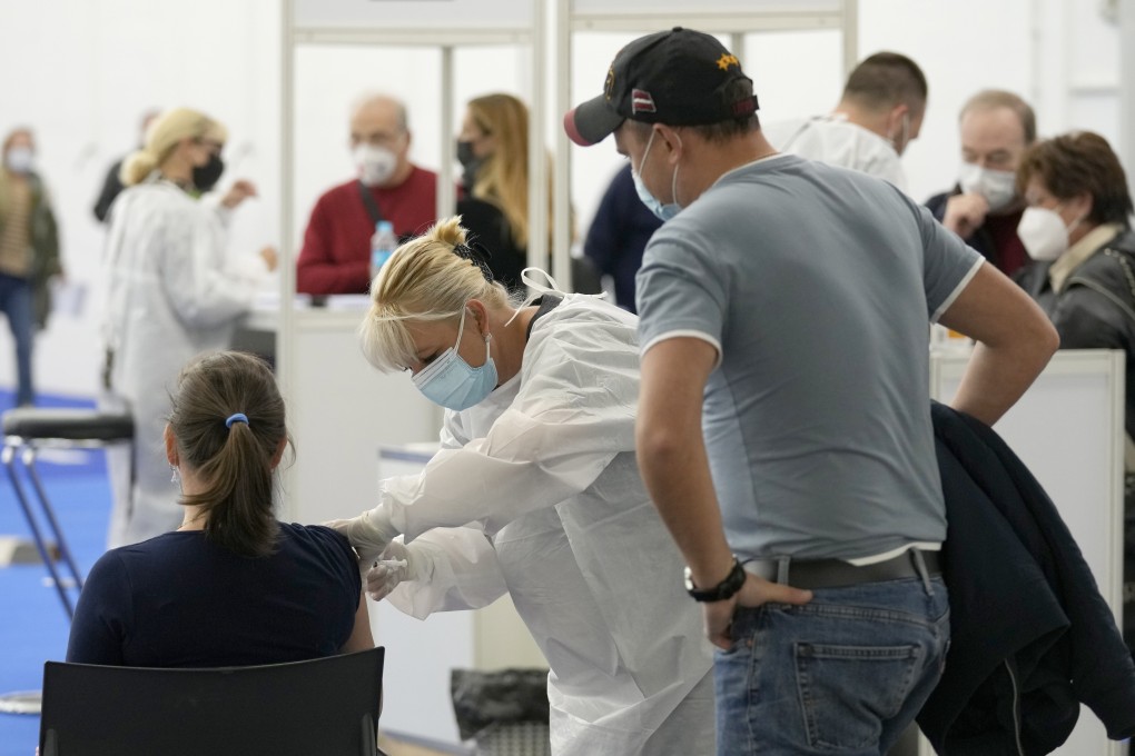 A woman is given a Covid-19 vaccine in Croatia on Tuesday. Europe is the only region in the world where both cases and deaths are increasing. Photo: AP