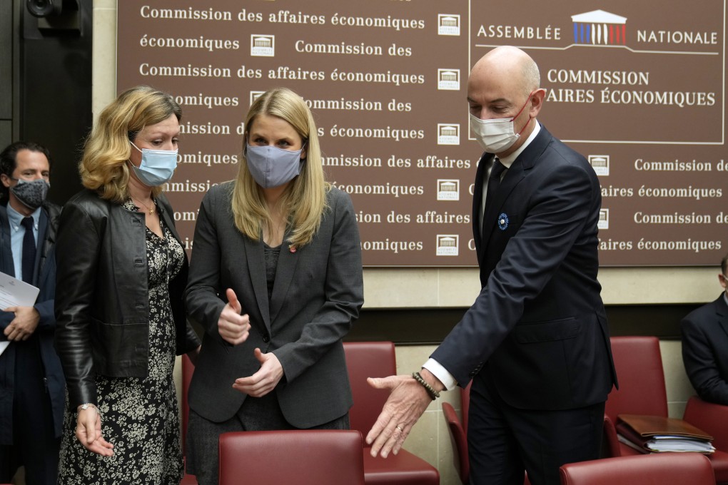 Facebook whistleblower Frances Haugen, centre, arrives for a hearing with lawmakers in Paris on November 10. She has warned that the "metaverse," the virtual reality world at the heart of the social media giant's growth strategy, will be addictive and rob people of more personal information. Photo: AP