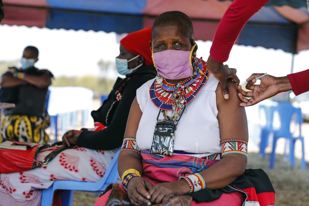 A woman receives an AstraZeneca vaccine. The firm will now start to take a ‘modest profit’ from its coronavirus vaccine as it moves away from the non-profit model it has operated so far but says profits will not be made from developing countries. Photo: AP