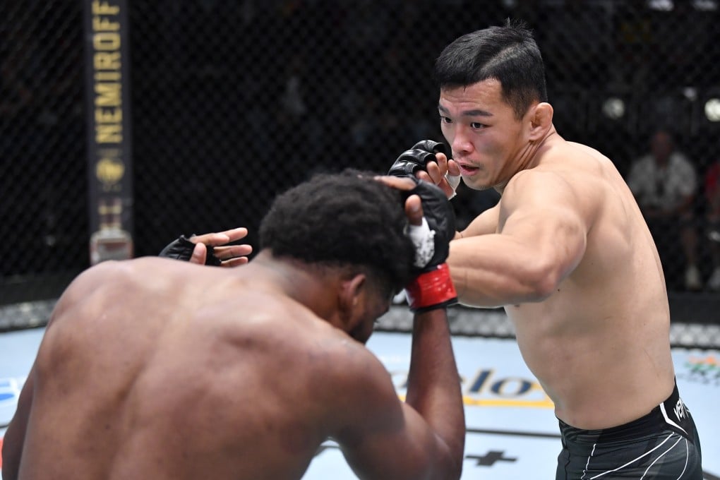 Da-un Jung punches Kennedy Nzechukwu during their light heavyweight fight in Las Vegas. Photo: Zuffa LLC
