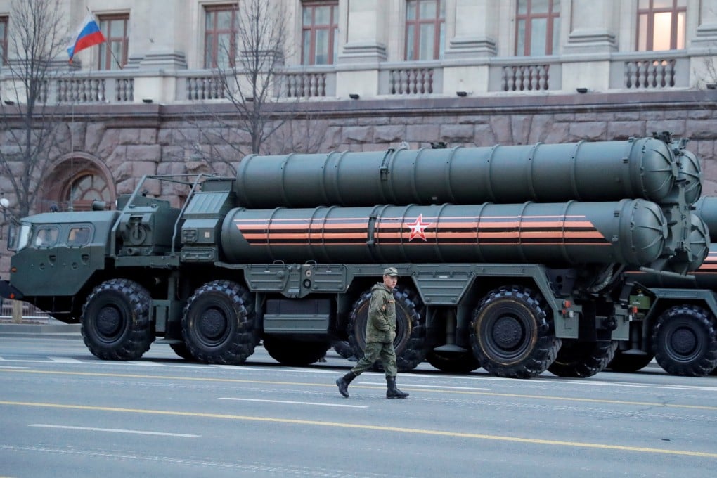 A Russian serviceman walks past S-400 missile air defence systems in Moscow. File photo: Reuters