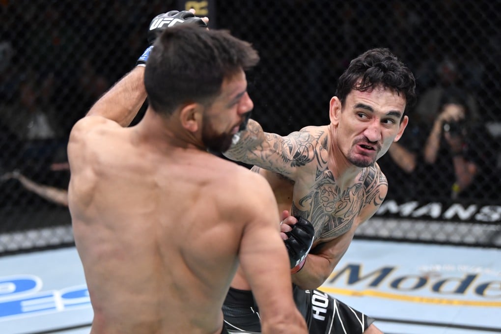 Max Holloway (right) lands a punch on Yair Rodriguez during their featherweight fight in Las Vegas. Photo: Zuffa LLC