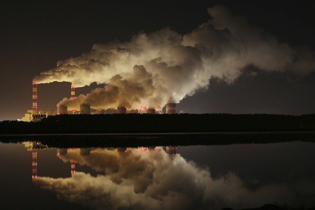 Plumes of smoke rise from Europe’s largest lignite power plant in Belchatow, central Poland. File photo: AP