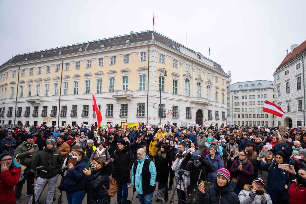 Anti-vaccination demonstrators protest in Vienna, Austria on Sunday. A nationwide lockdown began on Monday for those not vaccinated against Covid-19 or recently recovered, as the EU member fights a record surge in cases. Photo: AFP