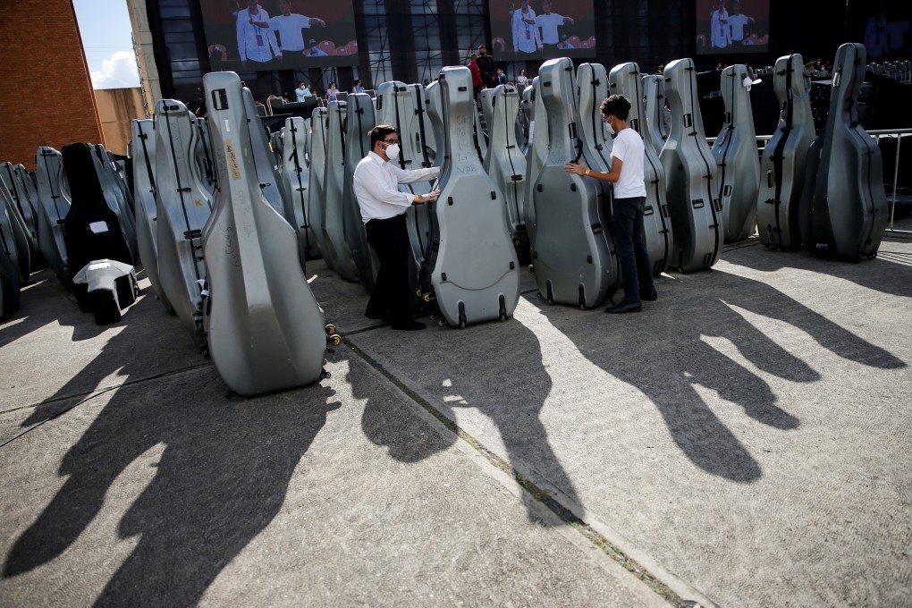 Members of Venezuela’s National System of Youth Orchestras and Choirs before they try to break the Guinness World Record for the largest orchestra in the world, in Caracas, Venezuela. Photo: Reuters