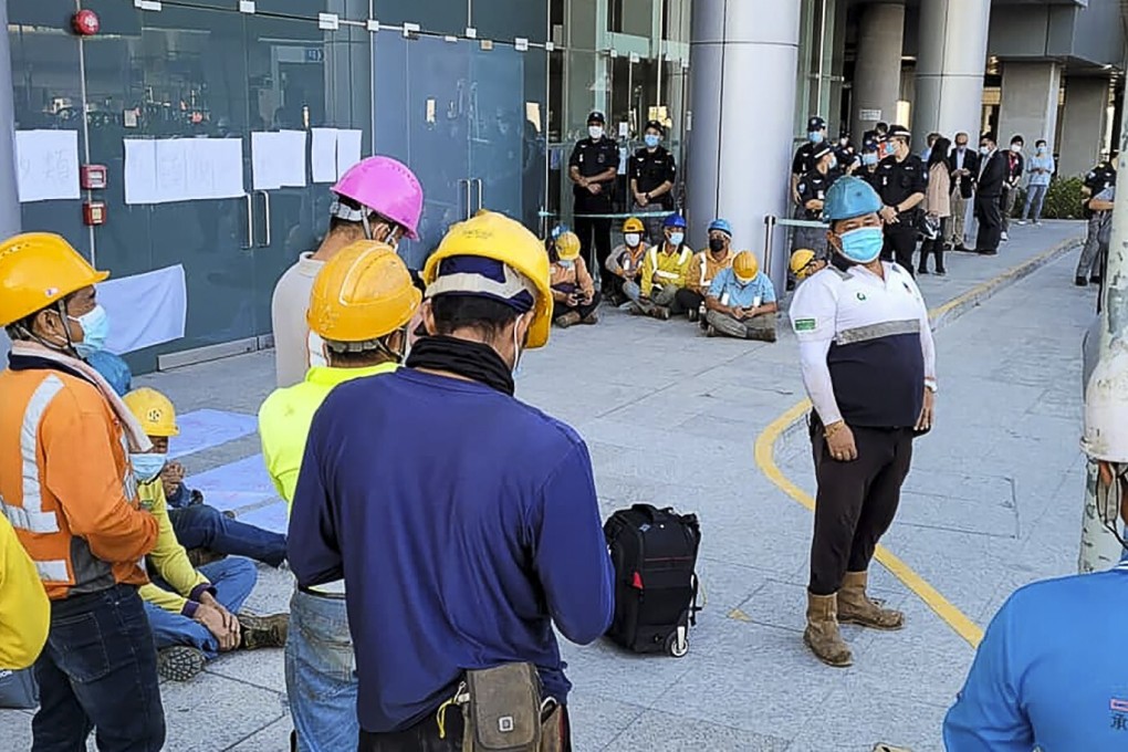 Workers at the third runway project stage a protest. Photo: Facebook