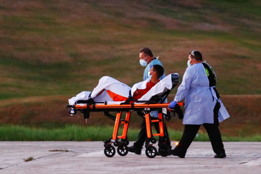A migrant is transferred on a stretcher after being rescued by a helicopter on the island of Gran Canaria, Spain on Monday. Photo: Reuters