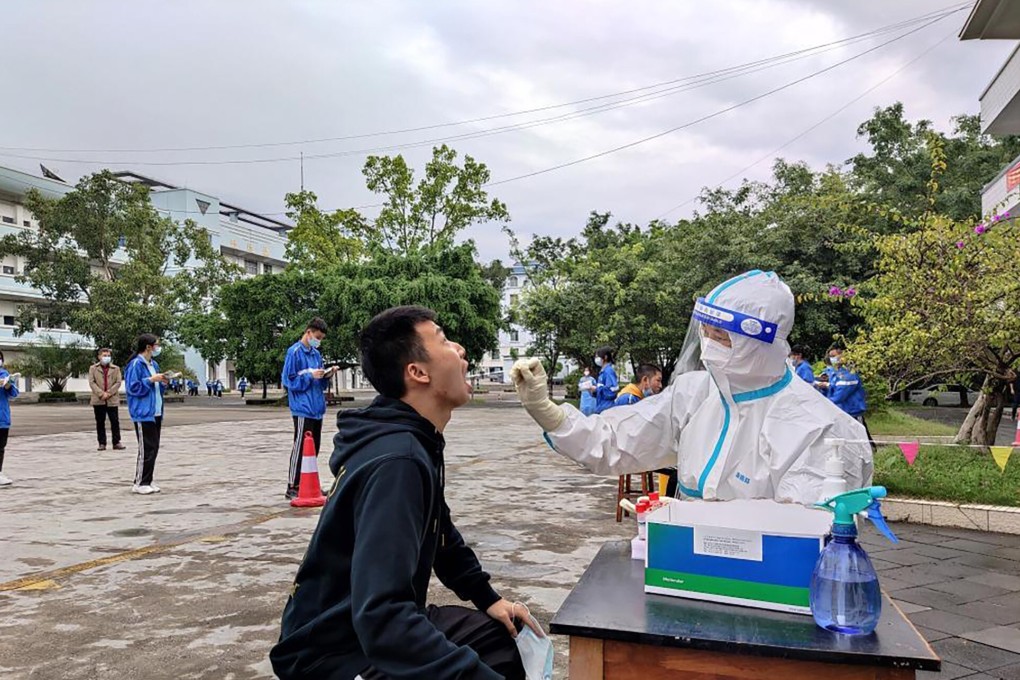 Students queue up to be tested for Covid-19 in Ruili. Photo: Xinhua