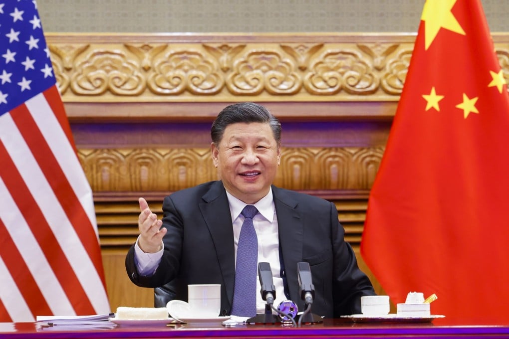 Chinese leader Xi Jinping meets US President Joe Biden by video link from Beijing on Tuesday. Photo: Xinhua