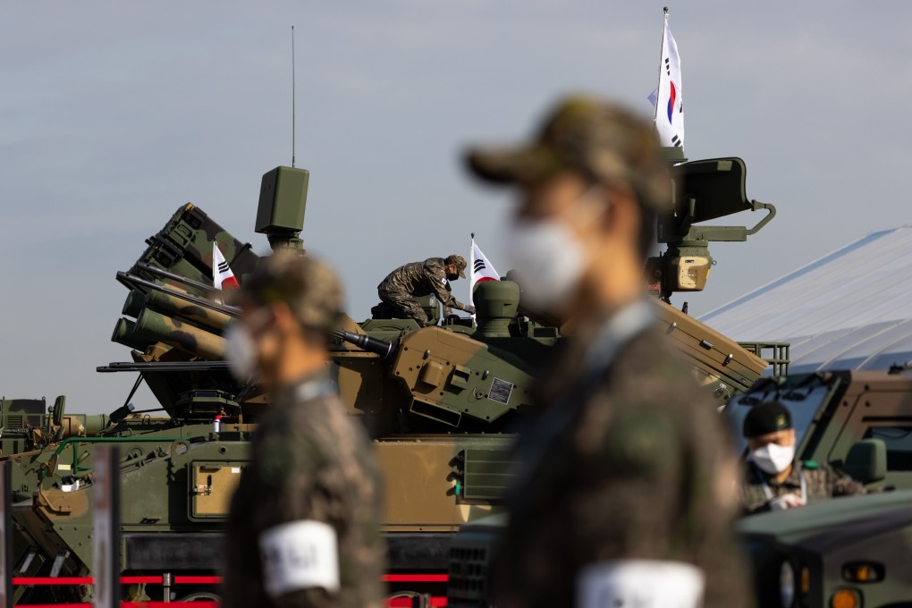 South Korean soldiers seen at an expo. The country is seeking to grow its defence exports. Photo: Bloomberg
