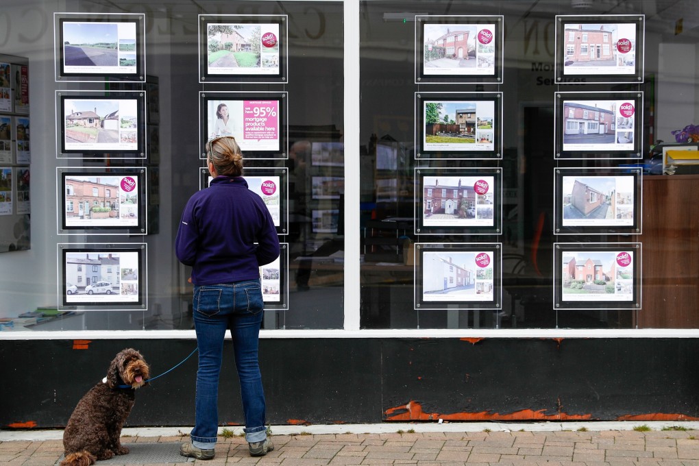 A property agent in Loughborough, UK. More than 474,000 homes were sold in the first half of the year in the UK, making it likely that they will surpass the about 818,000 homes sold in 2020. Photo: Bloomberg
