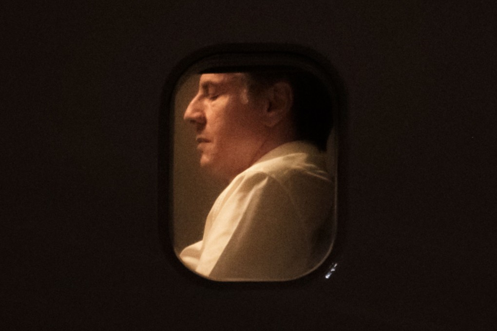 US Secretary of State Antony Blinken, pictured through the window of a US aircraft, arrives in Nairobi, Kenya. Photo: AFP