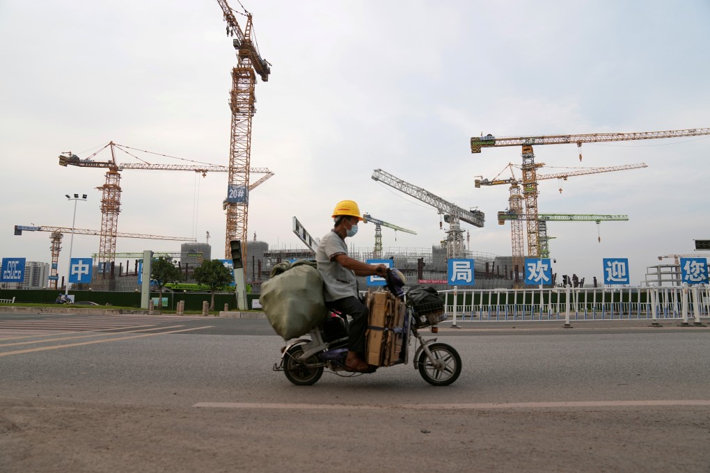 A China Evergrande Group construction site in Guangzhou. Opportunities in China might continue to grow, as default rates for Chinese high-yield bonds and the debts of its real estate sector were expected to top 13 per cent and 20 per cent, respectively, in 2021, Oaktree said in an insights publication this month. Photo: Reuters