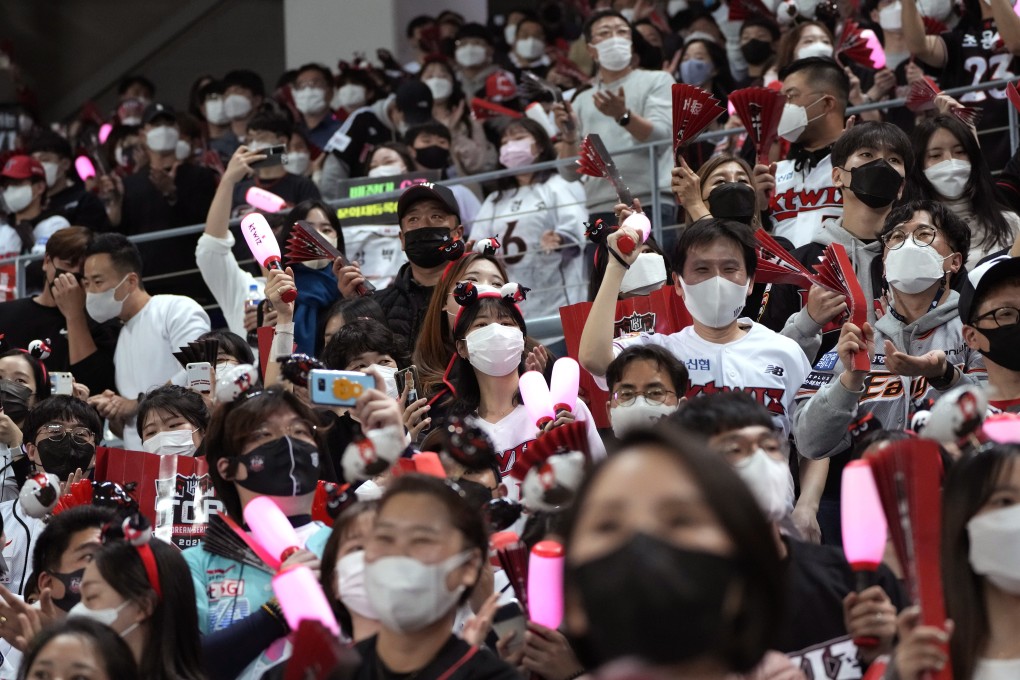 Fans cheer their teams during a baseball game in Seoul, South Korea. Photo: AP