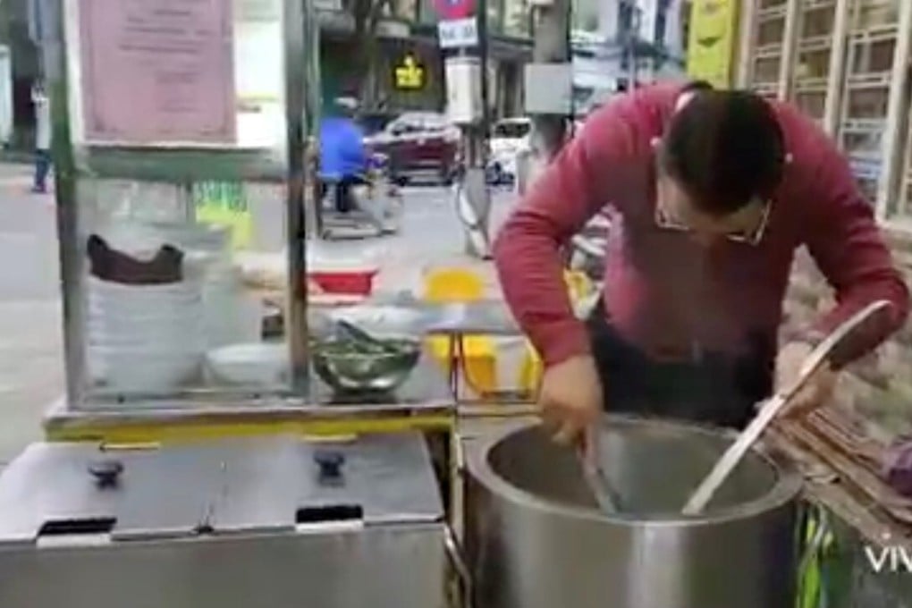 Bui Tuan Lam, 38, cooks at his beef noodle shop, in Da Nang, Vietnam, on November 11 in this image from a social media video. Photo: Bui Tuan Lam via Reuters