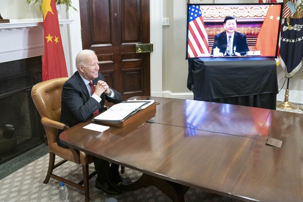 Joe Biden talks to Xi Jinping via videolink. Photo: UPI/Bloomberg