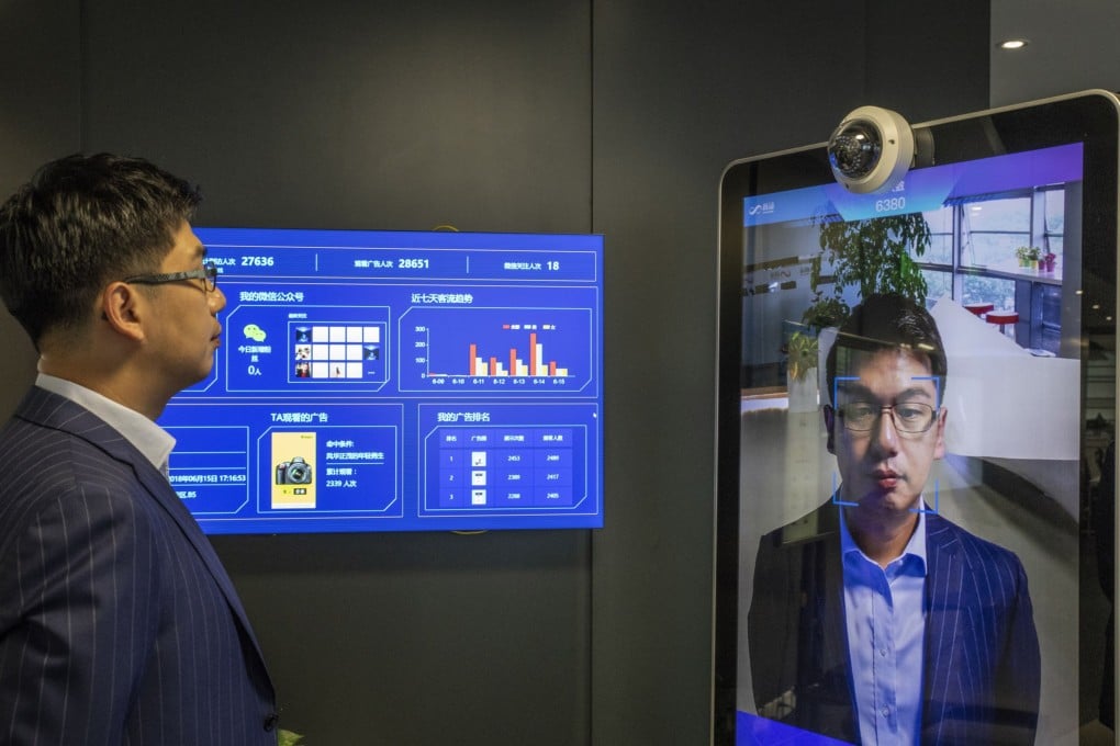 Xu Li, chief executive officer of SenseTime Group, is identified by the company's facial recognition system on a screen at the company’s showroom in Beijing on June 15, 2018. Photo: Bloomberg