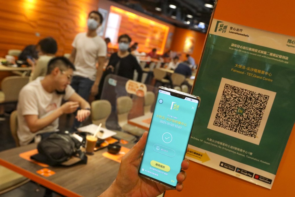 Diners will soon be required to use the ‘Leave Home Safe’ app when visiting all Hong Kong restaurants, with paper submissions to be removed as an alternative. Photo: Felix Wong
