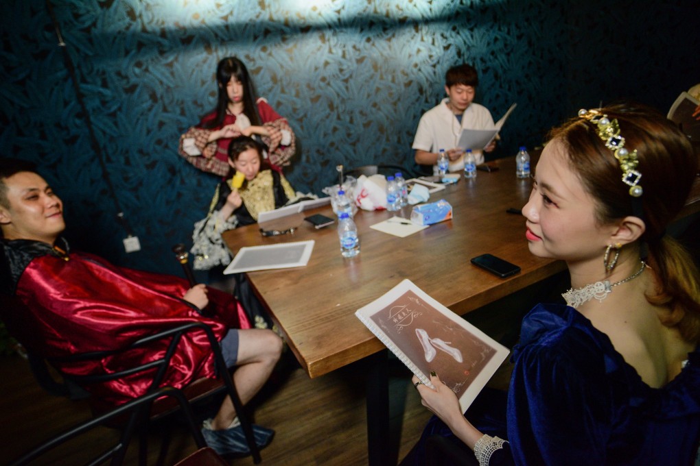 A group of players preparing to take part in a live action role-play murder mystery game at a role play studio in Shanghai. Photo: AFP
