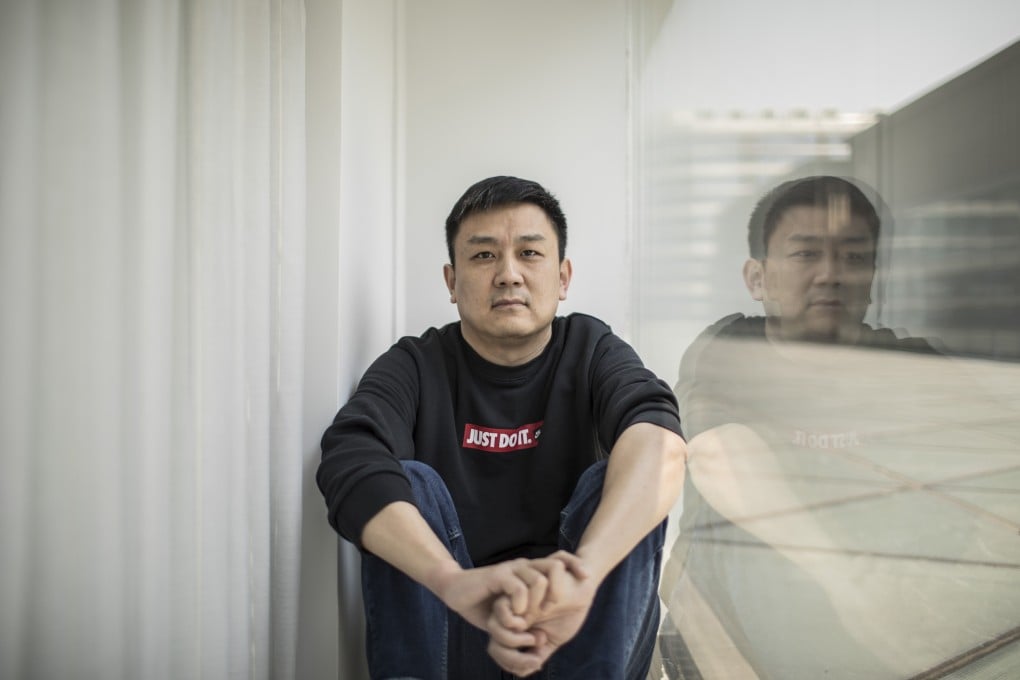 US citizen Daniel Hsu poses for a photo in April 2020 in the apartment he has been renting in Shanghai. Photo: AP