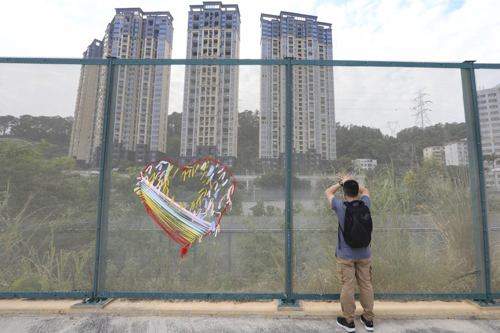 Two barbed wire fences 100 metres apart at the Liantang-Heung Yuen Wai border control point separate couples and families living in Hong Kong and on mainland China. Photo: Felix Wong