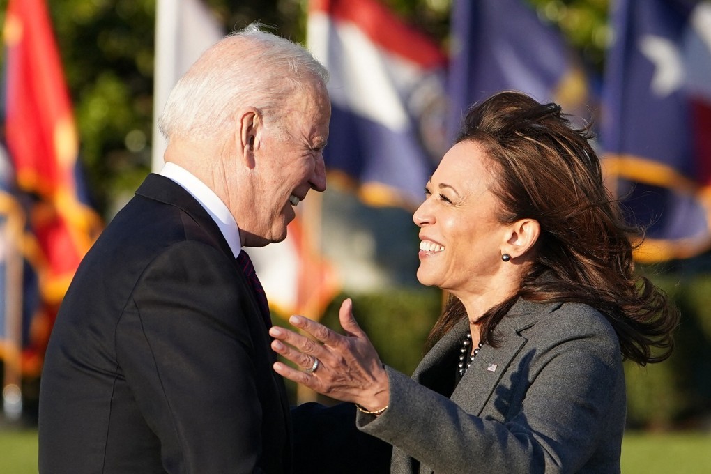 US Vice-President Kamala Harris hugs US President Joe Biden during the signing of the infrastructure bill on the South Lawn of the White House on Monday. Photo: TNS