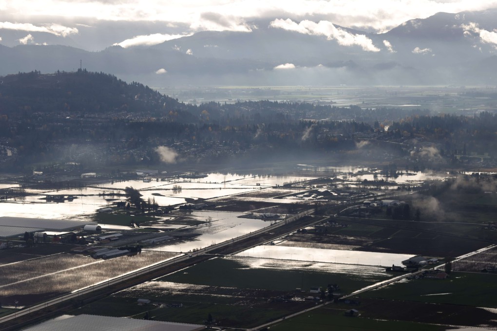 Floodwaters surround homes and farms in Abbotsford, British Columbia, Canada on Saturday. Photo: Getty Images / AFP
