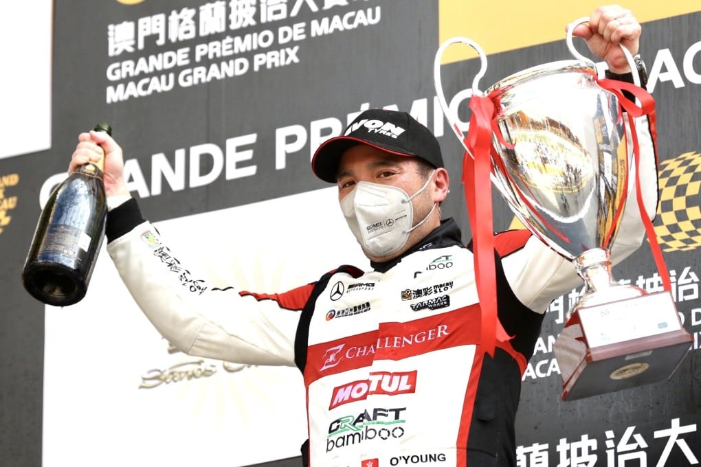 Hong Kong driver Darryl O'Young on top of the podium after winning the Macau Grand Prix GT Cup. Photo: Craft Bamboo Racing