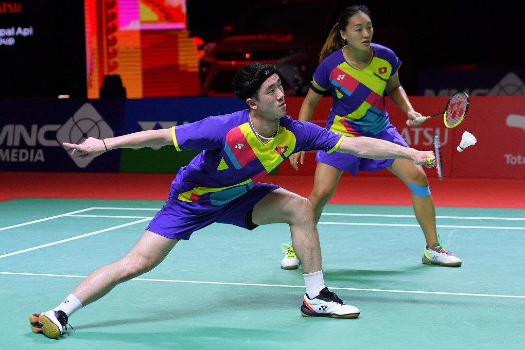 Hong Kong's Tang Chun-man (front) and Tse Ying Suet take on Japan's Yuta Watanabe and Arisa Higashino at the Indonesia Masters in Bali. Photo: AFP