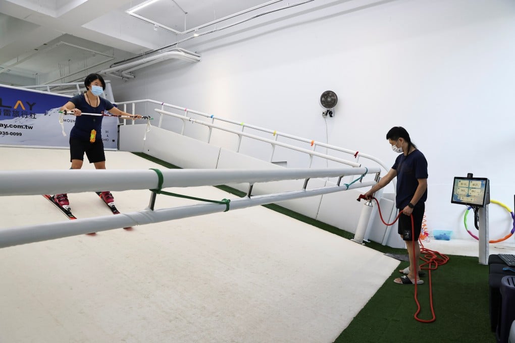 Taiwanese skier Lee Win-yi trains on a machine at her family’s indoor skiing facility as she targets the 2022 Winter Olympics. Photo: Reuters